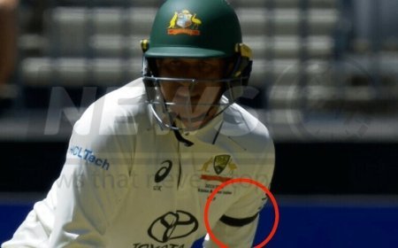 Australian cricketer Usman Khawaja expresses support for Gaza protest by wearing a black armband.