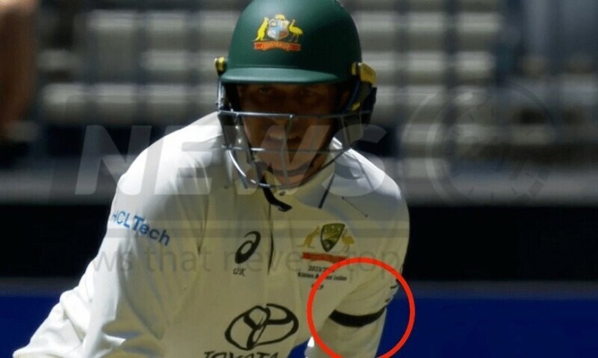 Australian cricketer Usman Khawaja expresses support for Gaza protest by wearing a black armband.